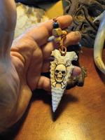 Carved antler Arrowhead with a skull
